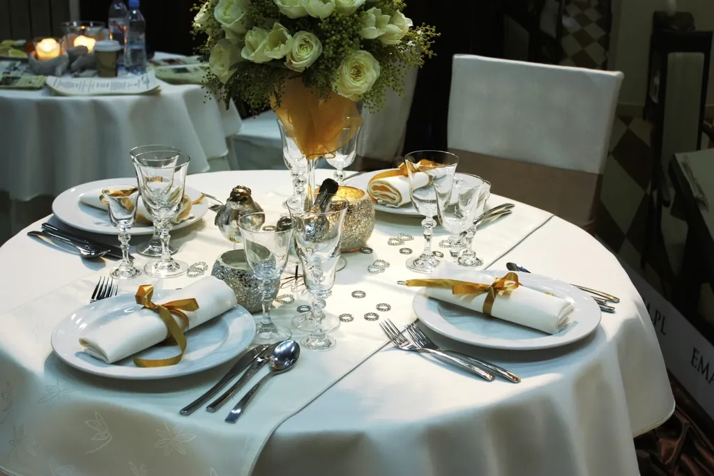 Round table setting with glassware and florals